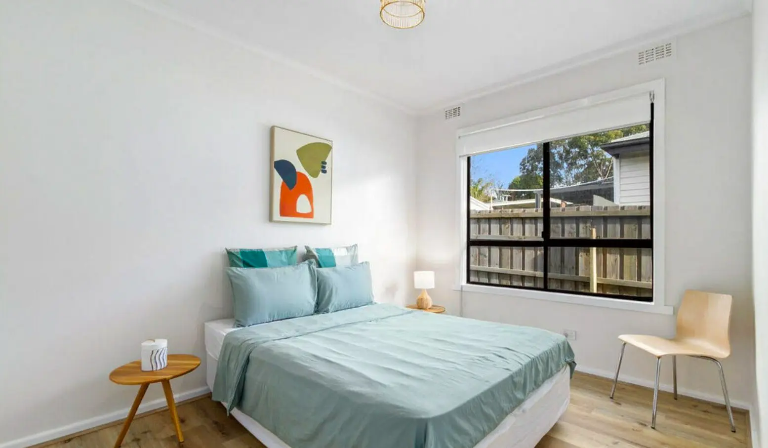 Hybrid flooring waterproof scratch-resistant timber look boards installed professionally.