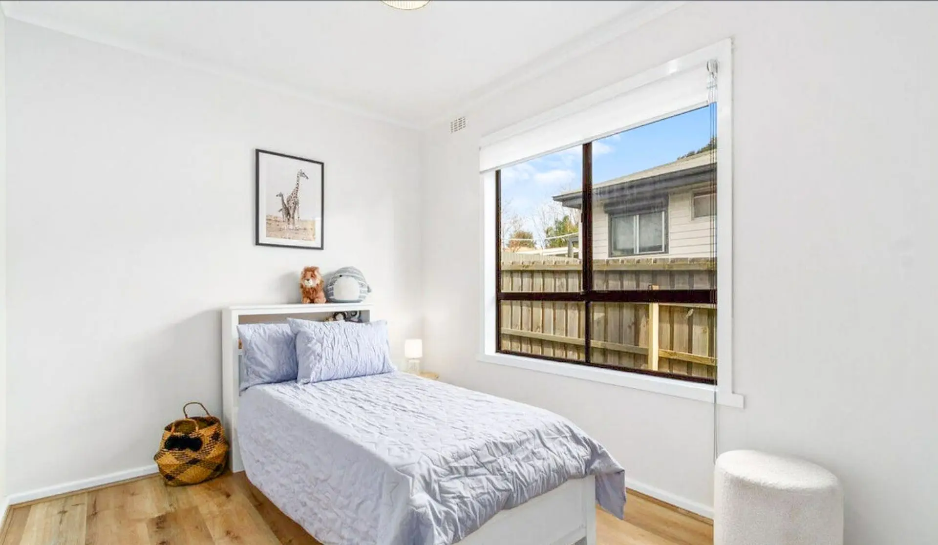 Bedroom renovation hybrid timber flooring and fresh white paint in Morwell