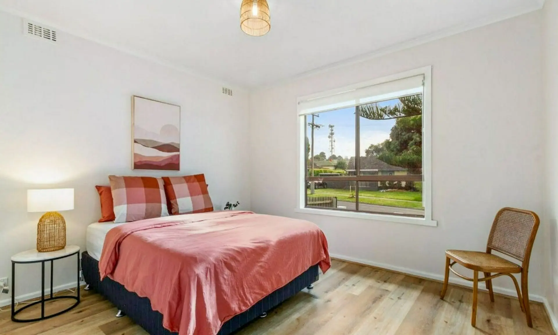 Modern full house renovation with hybrid timber flooring and white interior repaint