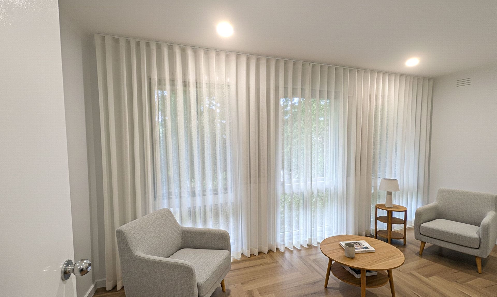 Soft sheer fabric curtains adding airy ambiance and privacy