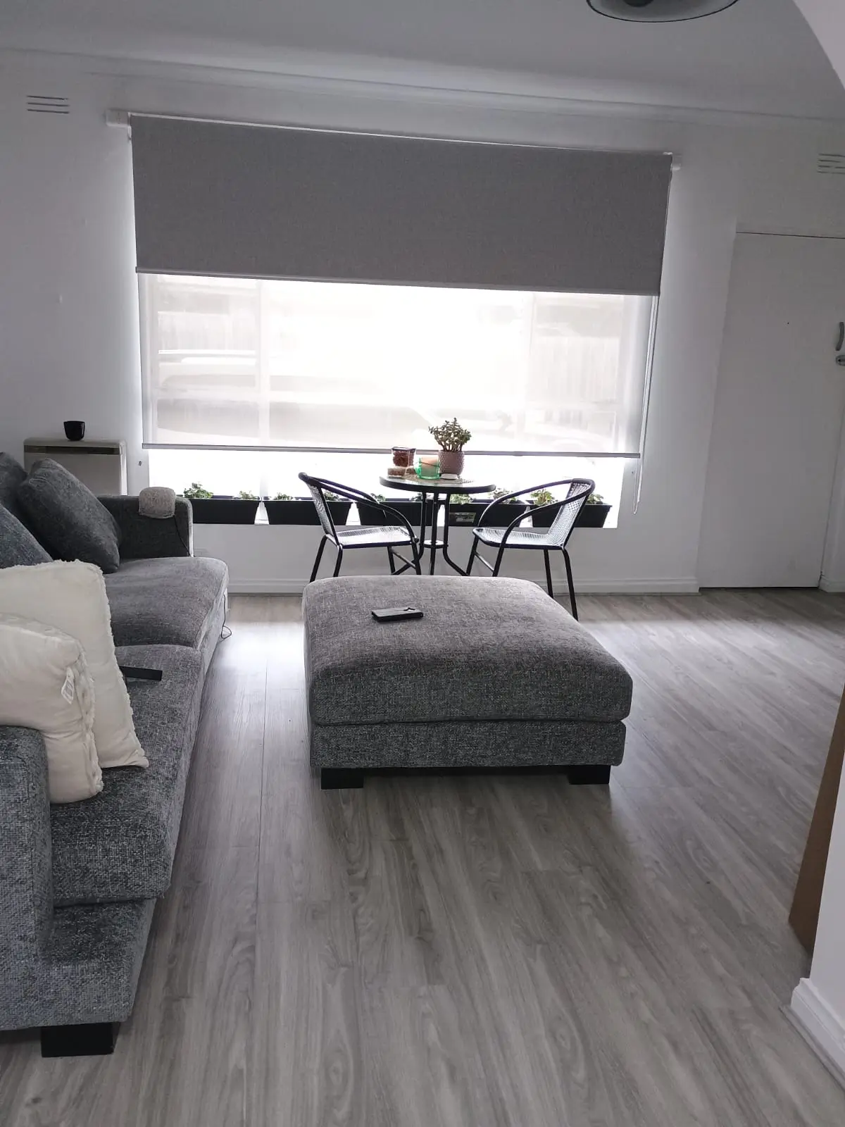 Quick and budget home upgrade with elegant sheer curtains and dual roller blinds installed