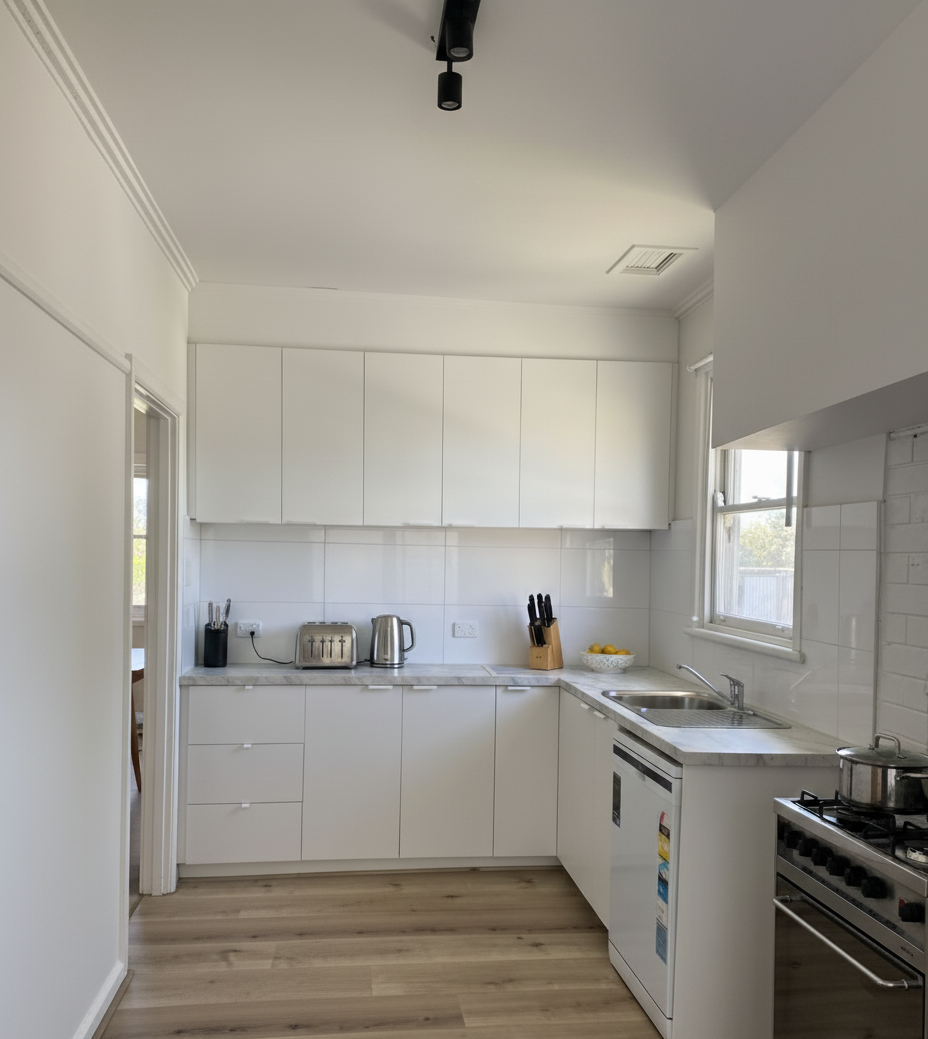 Full kitchen upgrade Morwell with clean white splashback and functional layout redesign.
