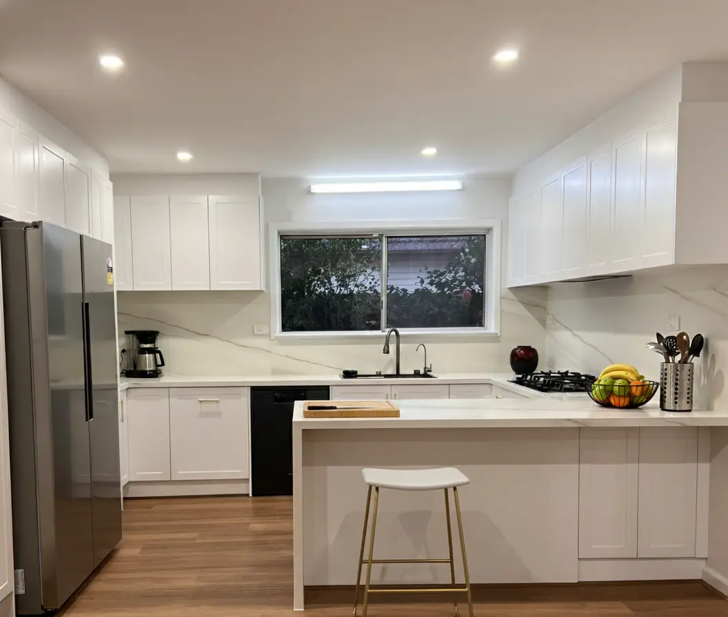 Cheap kitchen renovation with upgraded hybrid flooring, interior painting, and clean white cabinetry.