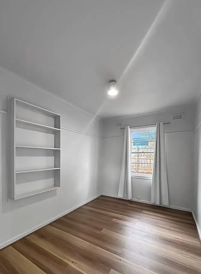 Low cost home renovation in Victoria featuring premium-look hybrid flooring.