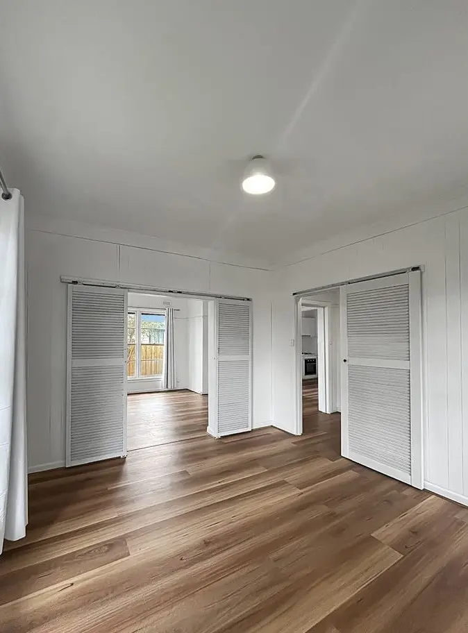 Cheap flooring renovation showcasing newly installed hybrid flooring