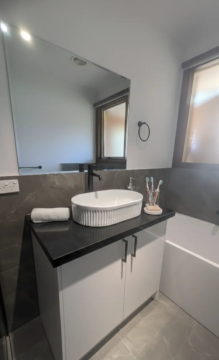 Bathroom refresh with new vanity, basin, and contemporary fixtures