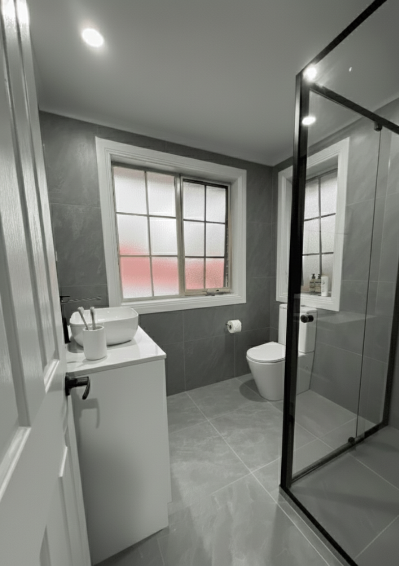 Custom bathroom upgrade with modern finishes, smart storage solutions, and a sleek visual design.