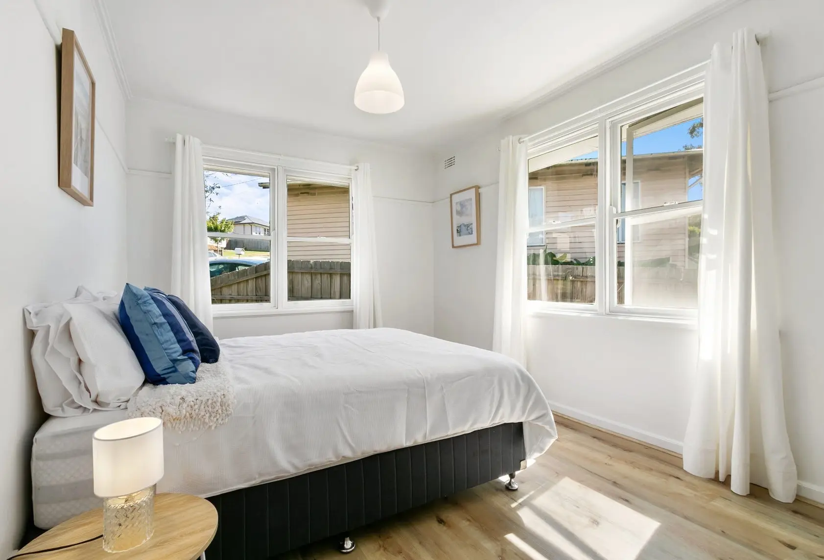 Hybrid flooring installation replacing old carpet and vinyl for a durable modern finish throughout the home