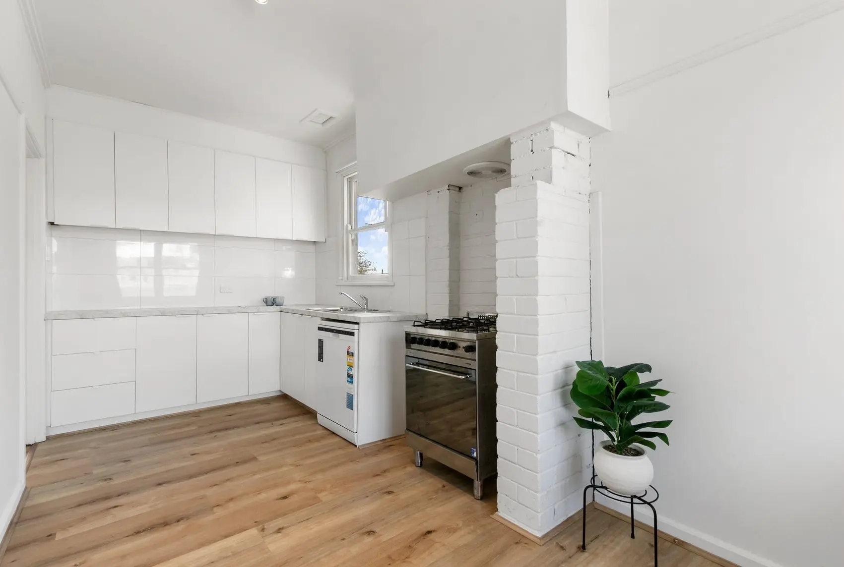 Fast bright kitchen improvement Morwell repaint and cabinetry.