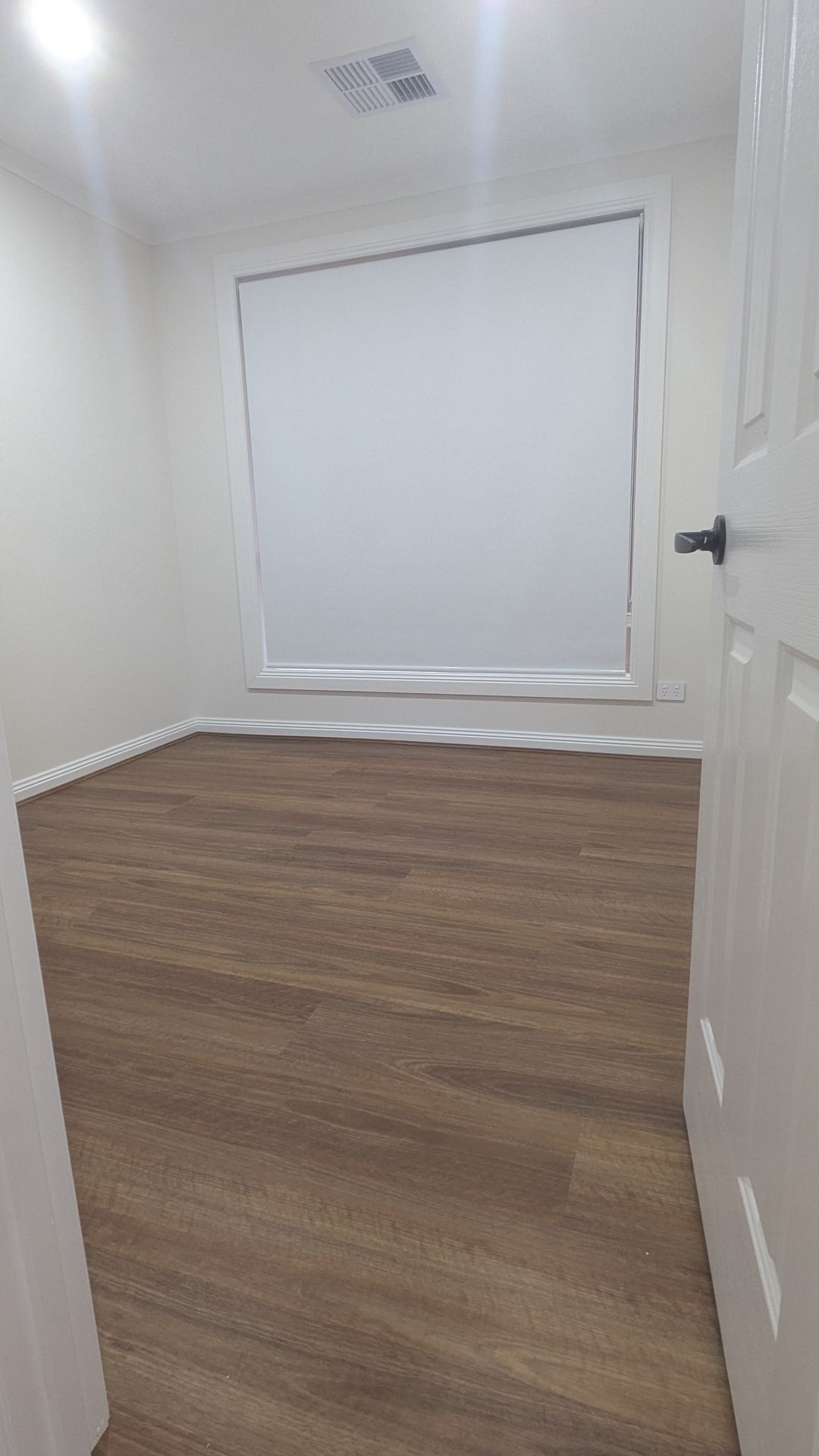 Interior painting and flooring upgrade combined to modernize the entire home during renovation.