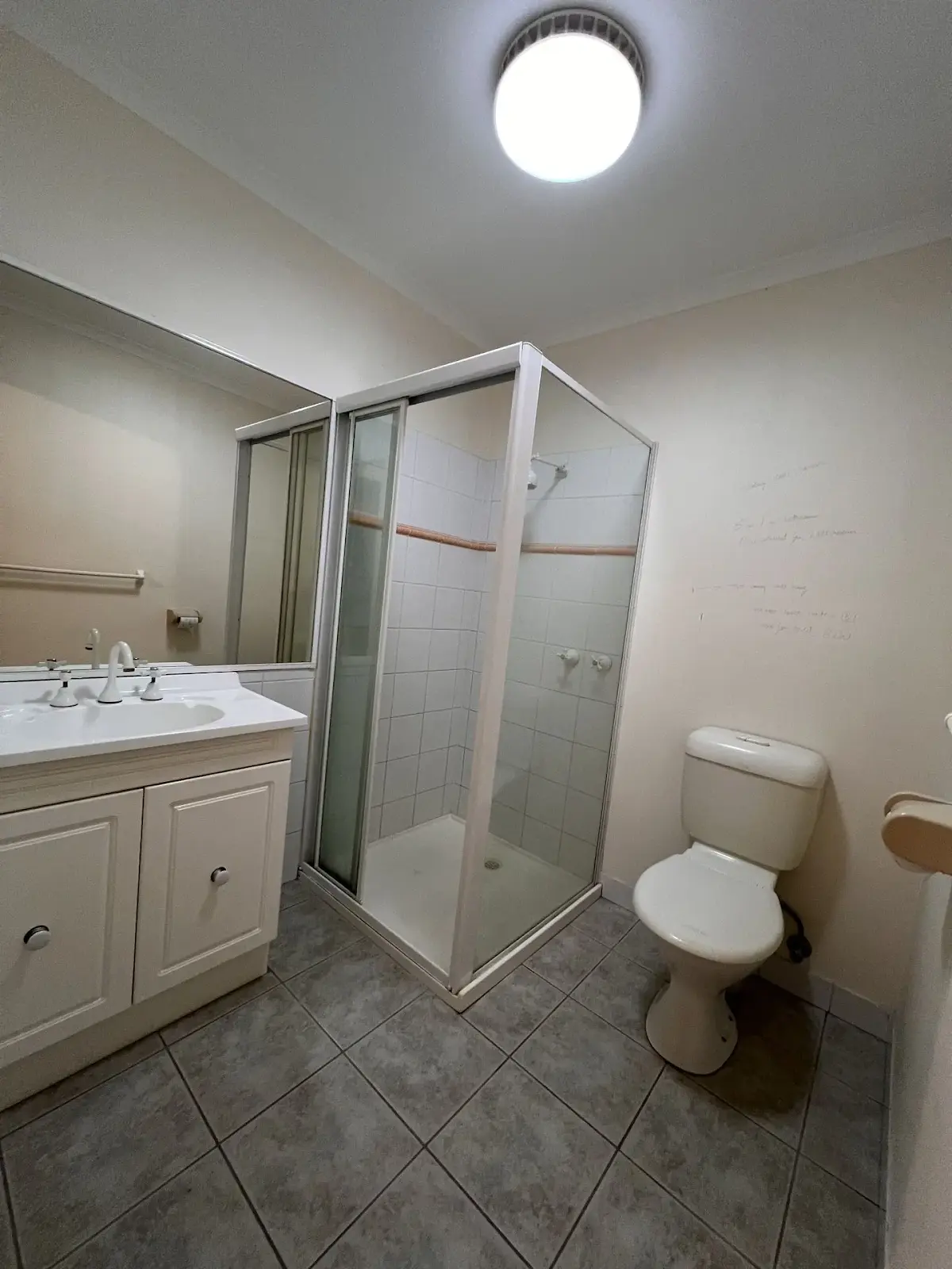 Fast bathroom renovation in Morwell with full tiling and shower screen upgrade.