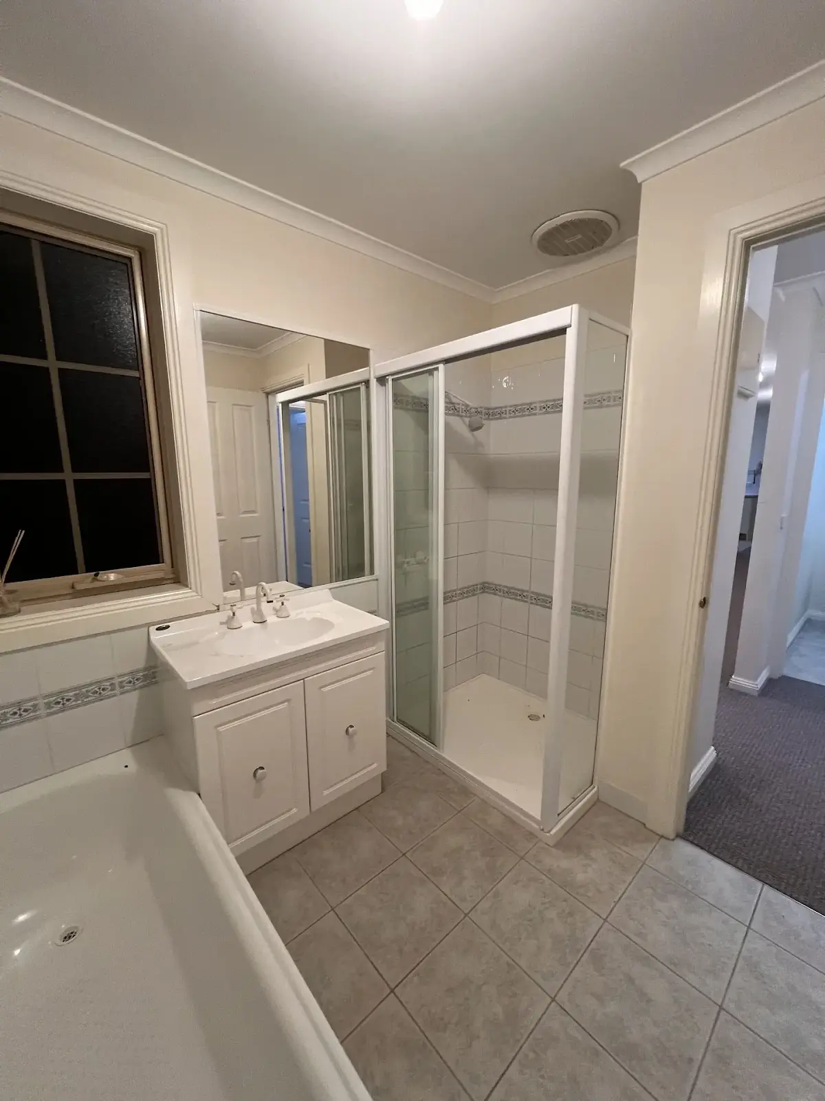 Budget bathroom renovation in Ringwood with vanity, tapware and plumbing upgrades.